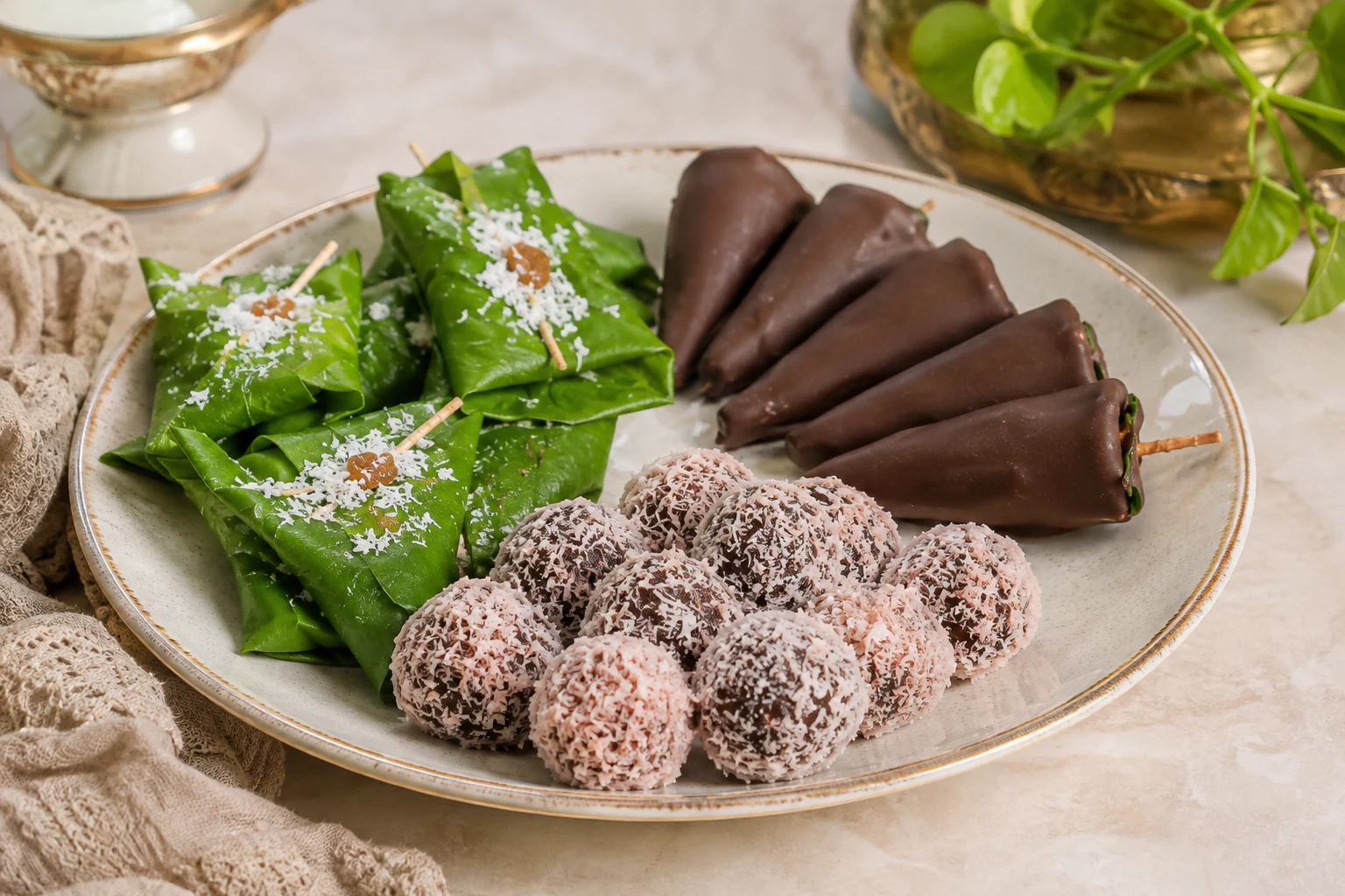Paan sweets and coconut-coated Paan Balls arranged on a plate