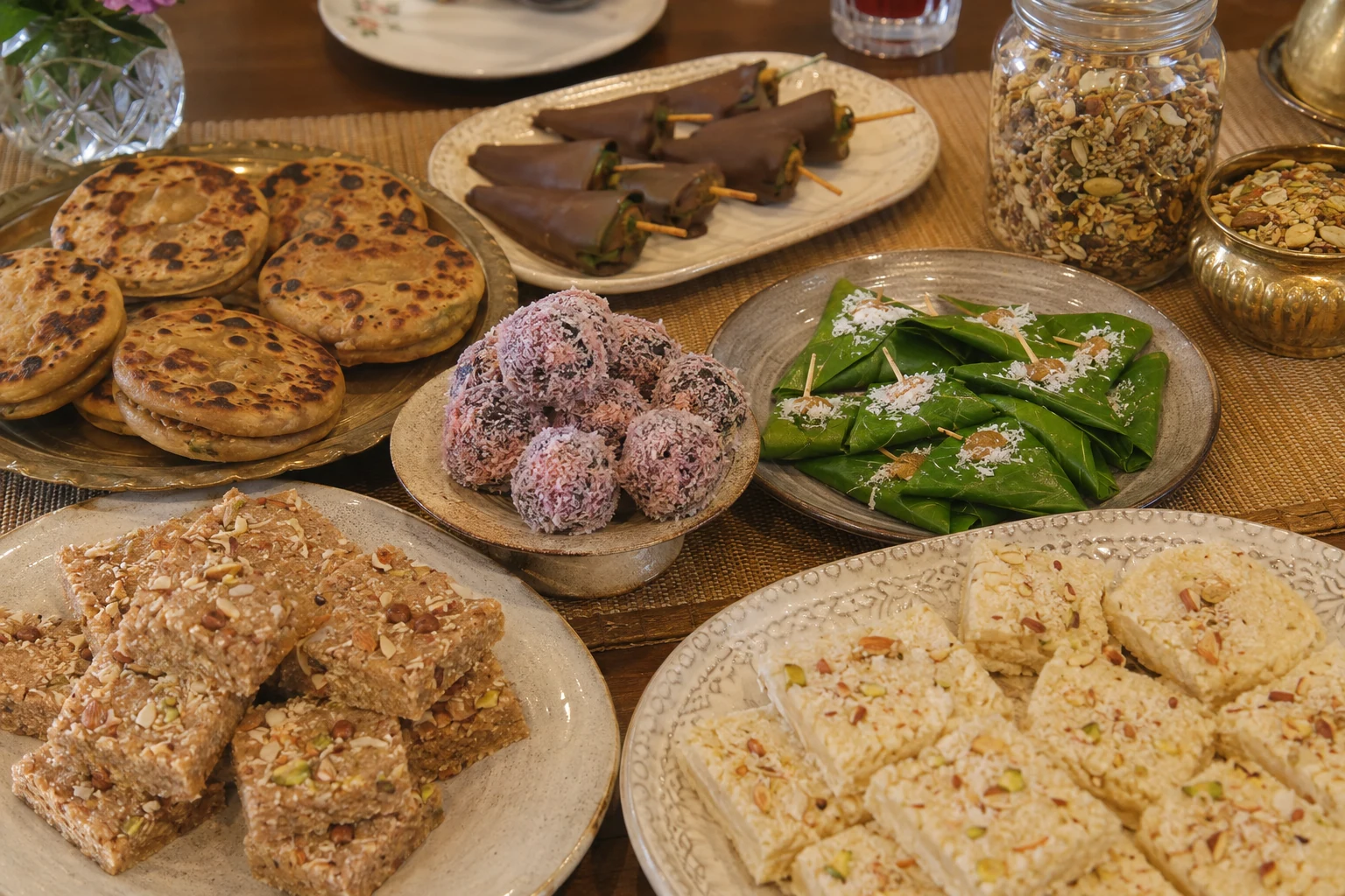 A generous table of Zahra Sweets served for a dawat