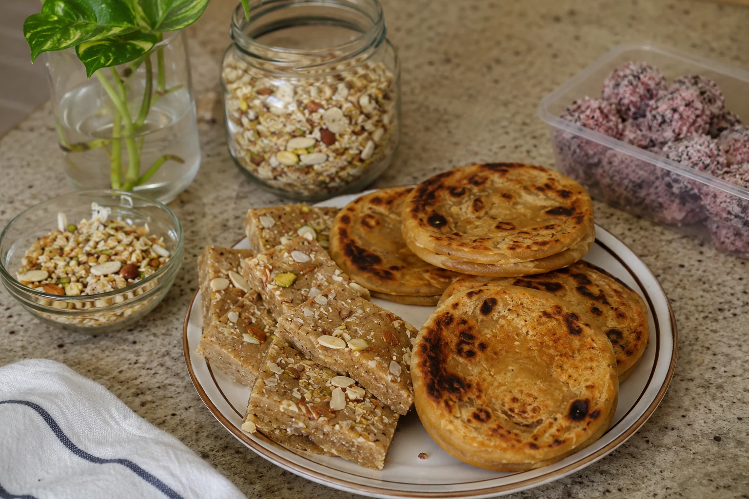 A family-style assortment of Zahra Sweets served together